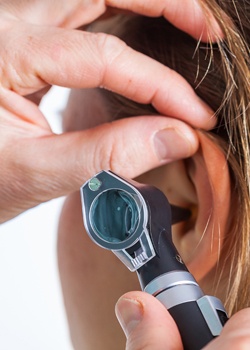 audiologist assessing hearing