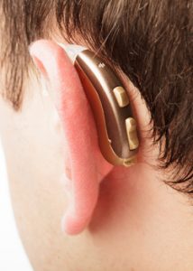 hearing aid in place behind ear